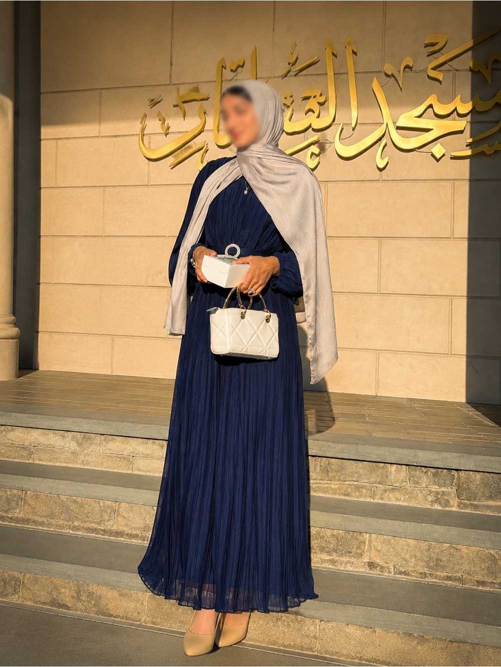 Elegant Navy Pleated Maxi Dress with Cream Accessories